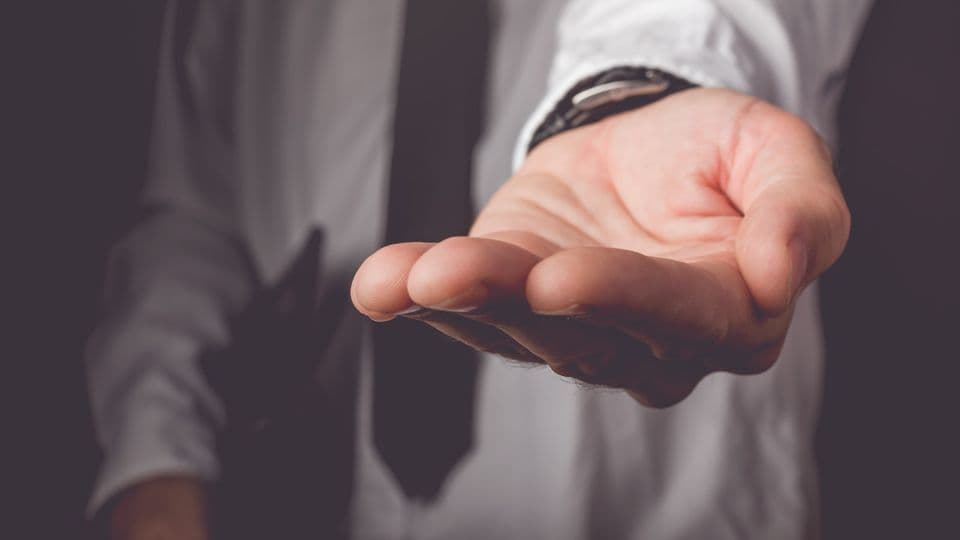 Businessman requesting for money loan, retro toned image, selective focus